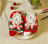 Kalėdinės kojinės, paruoštos dovanai