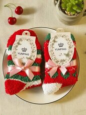Kalėdinės kojinės, paruoštos dovanai