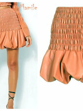 Persikų spalvos dirbtinės odos sijonai